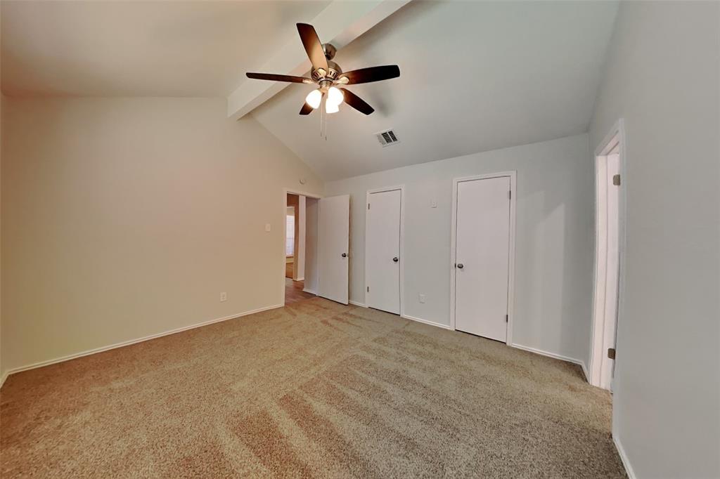 7809 Meadowlark Lane Rowlett, TX 75088 - Photo 8 of 18 a view of an empty room with a chandelier fan