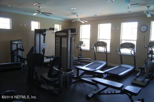 12958 Spring Rain Road Jacksonville, FL 32258 - Photo 17 of 18 a view of a workspace with furniture and a window