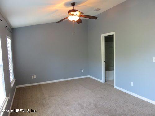12958 Spring Rain Road Jacksonville, FL 32258 - Photo 10 of 18 a view of an empty room with window