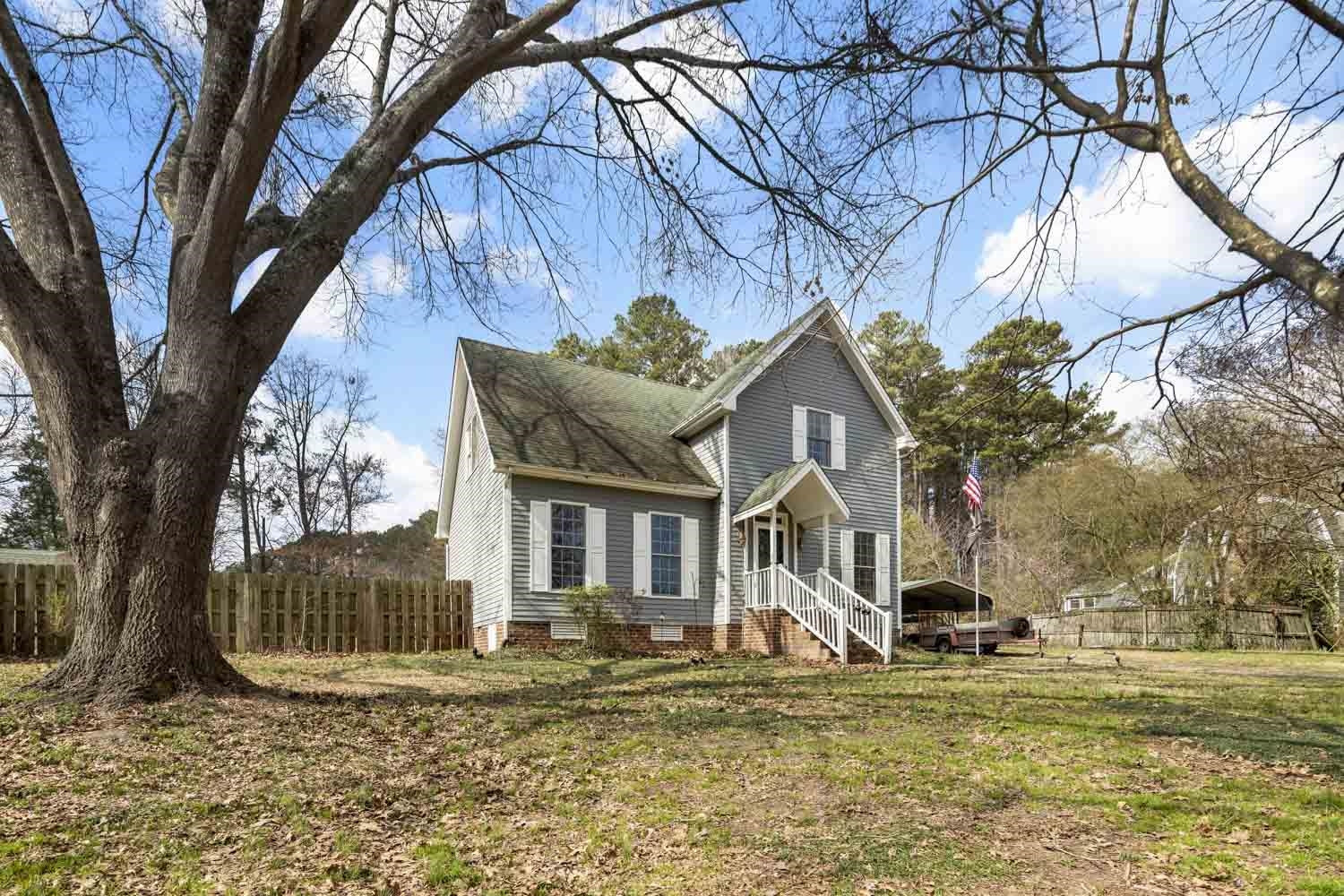 2109 Howson Road Raleigh, NC 27603 - Photo 2 of 36 a view of a house with a yard