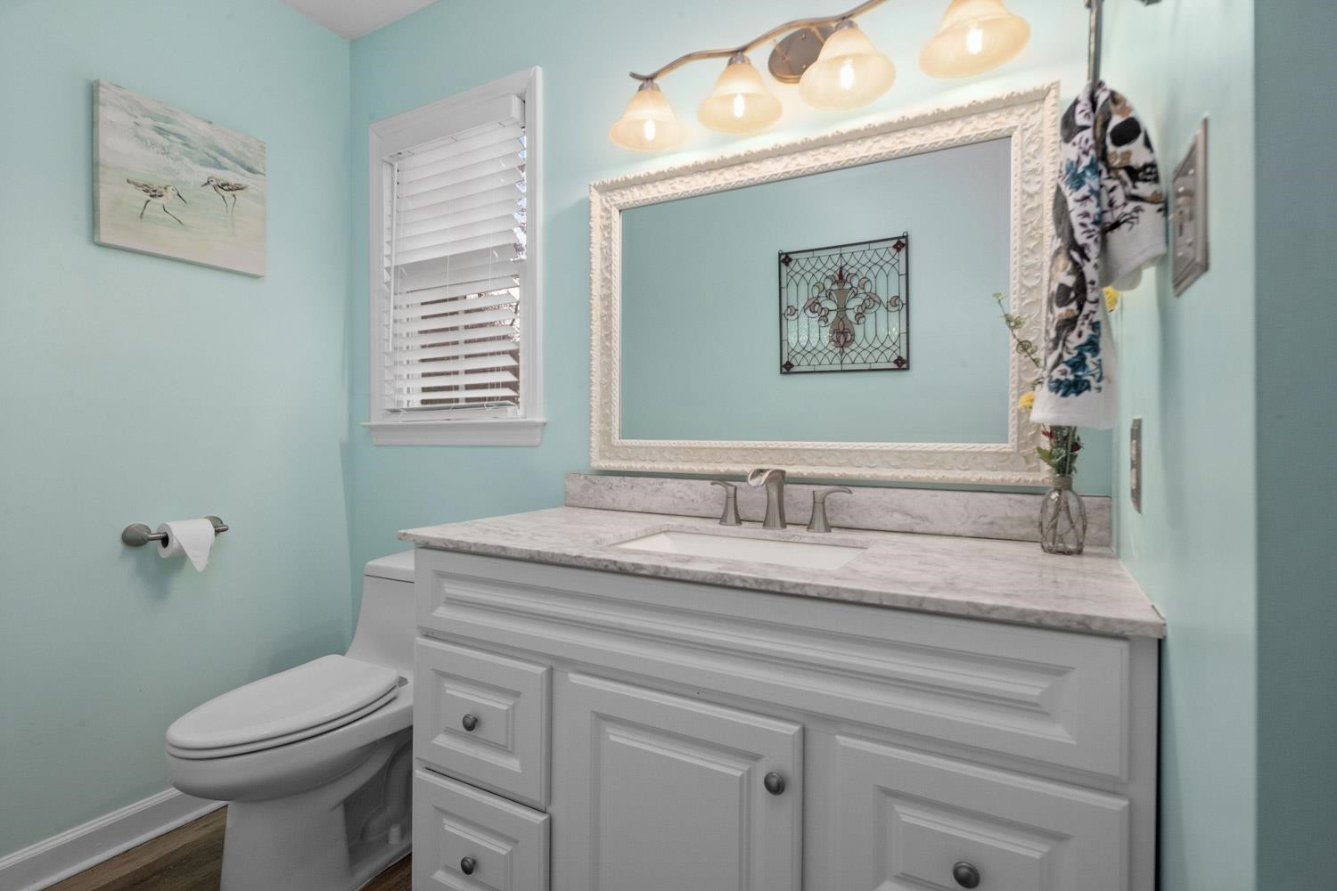 2109 Howson Road Raleigh, NC 27603 - Photo 25 of 36 a bathroom with a granite countertop sink mirror vanity and toilet