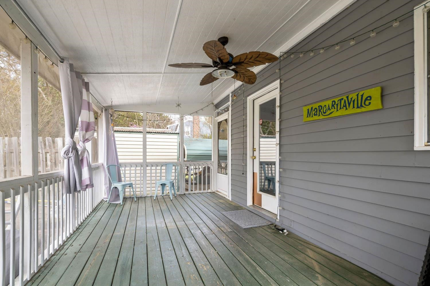 2109 Howson Road Raleigh, NC 27603 - Photo 5 of 36 a view of a porch with wooden floor