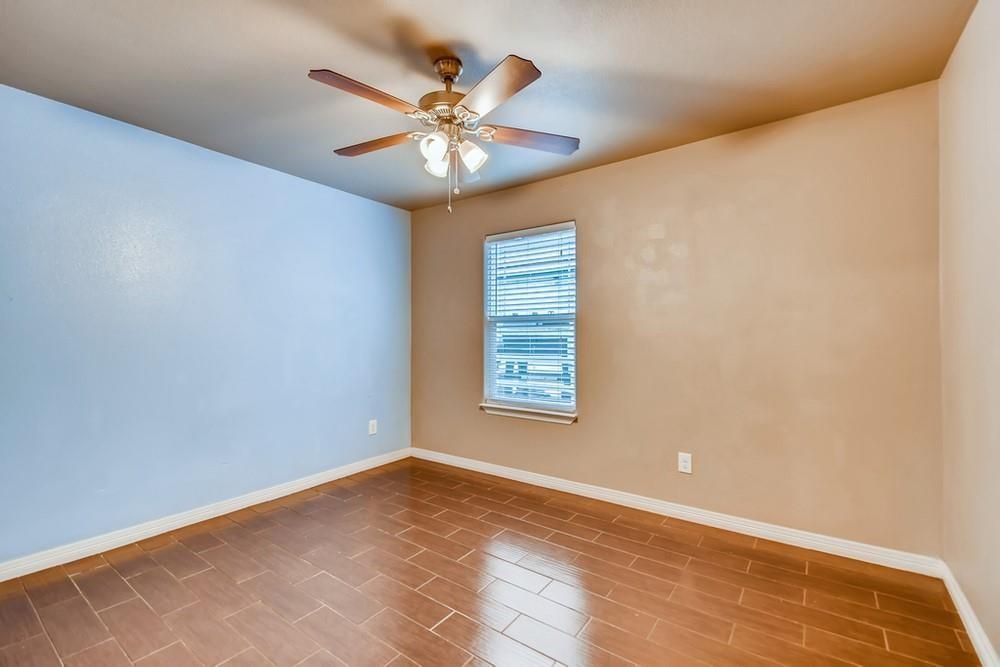 713 Rike Street McKinney, TX 75069 - Photo 21 of 29 a view of an empty room with a window