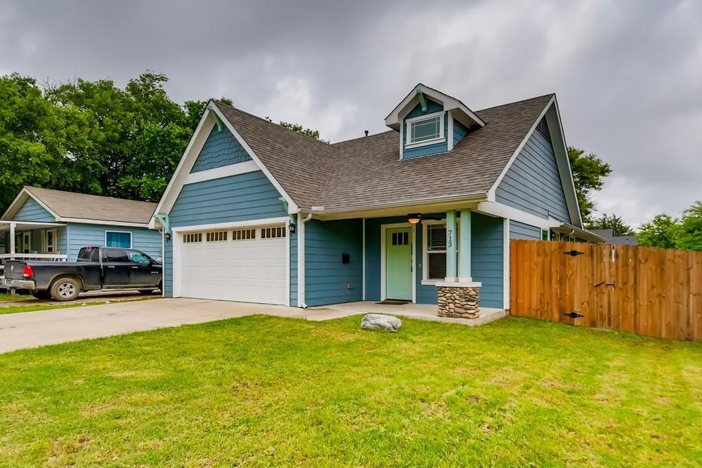 713 Rike Street McKinney, TX 75069 - Photo 25 of 29 a front view of house with yard outdoor seating and barbeque oven