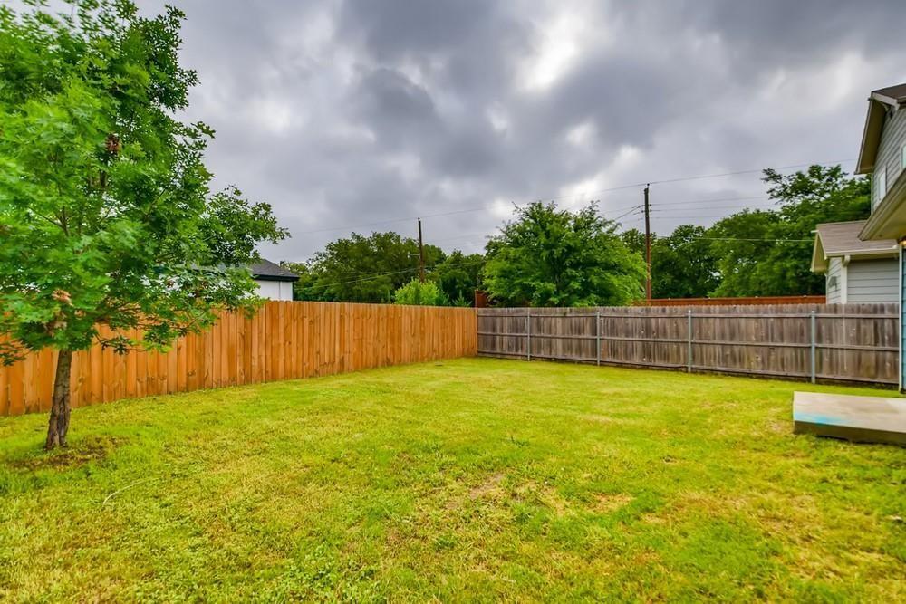 713 Rike Street McKinney, TX 75069 - Photo 28 of 29 a view of a swimming pool and a yard