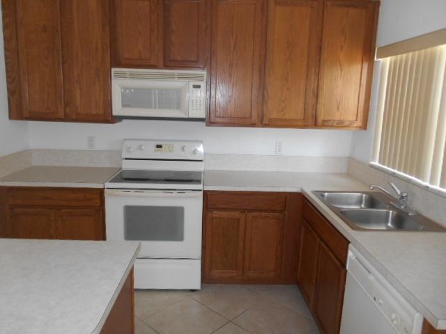 1093 Big Torch Street Riviera Beach, FL 33407 - Photo 6 of 36 Kitchen