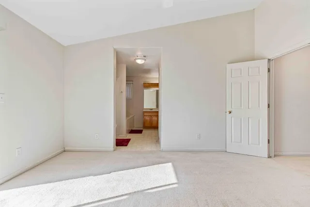 a bathroom with a tub and shower