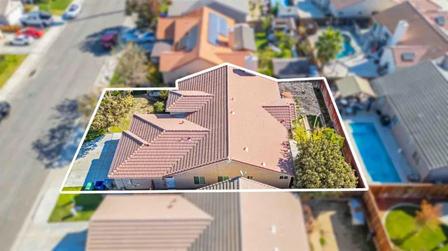 an aerial view of a house with a garden
