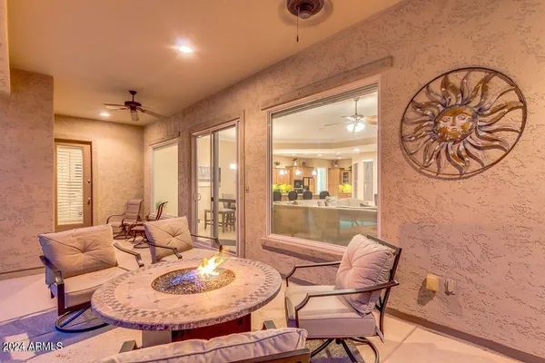 a view of a swimming pool with a patio