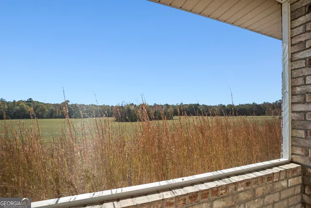 a view of a lake from a balcony