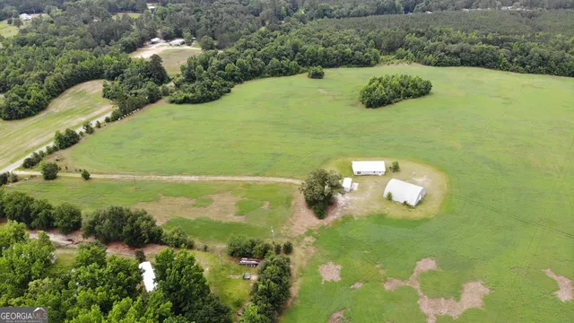 a view of a lake with a yard
