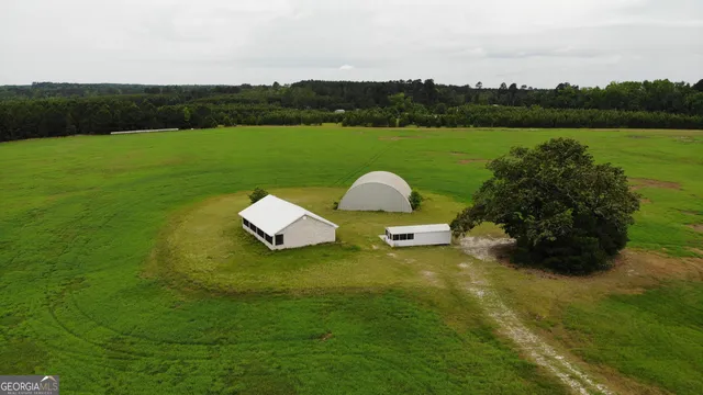 a view of a lake with a yard