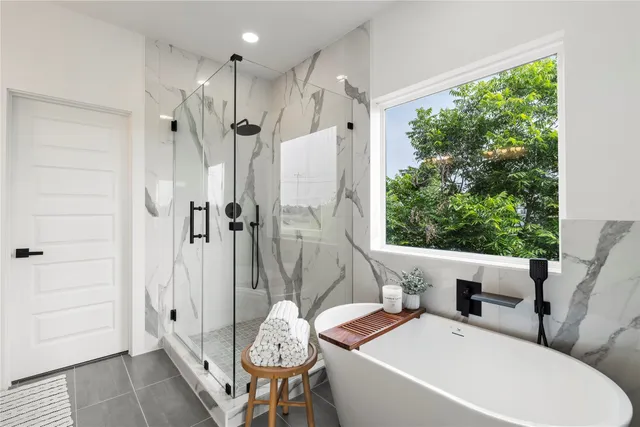 a bathroom with a double vanity sink and mirror