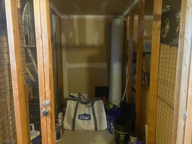 a bathroom with a shower and a mirror