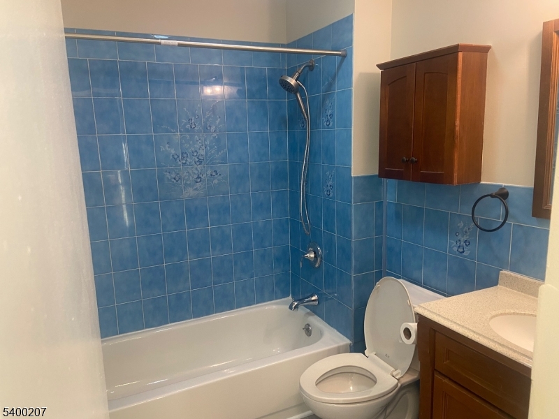 5 Terrace Drive Chatham, NJ 07928 - Photo 9 of 13 a bathroom with a sink a toilet and bathtub