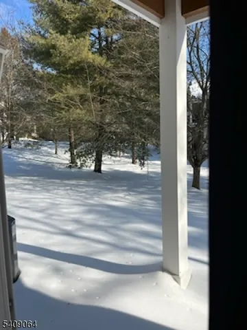 a view of livingroom from the hallway