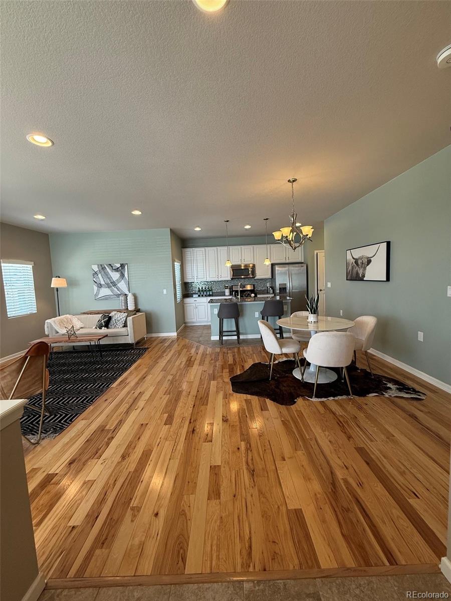 2028 South Flanders Way, Unit A Aurora, CO 80013 - Photo 11 of 30 a living room with furniture