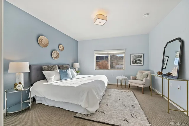 a bathroom with double vanity sink and a mirror