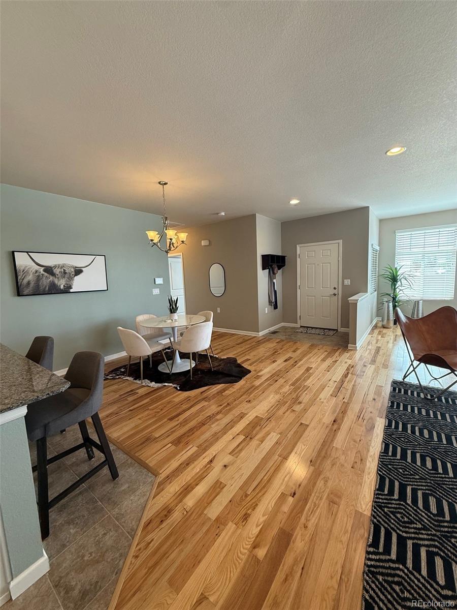 2028 South Flanders Way, Unit A Aurora, CO 80013 - Photo 7 of 30 a living room with furniture