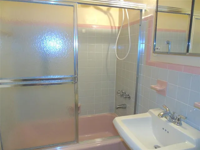 a view of a room with wooden walls