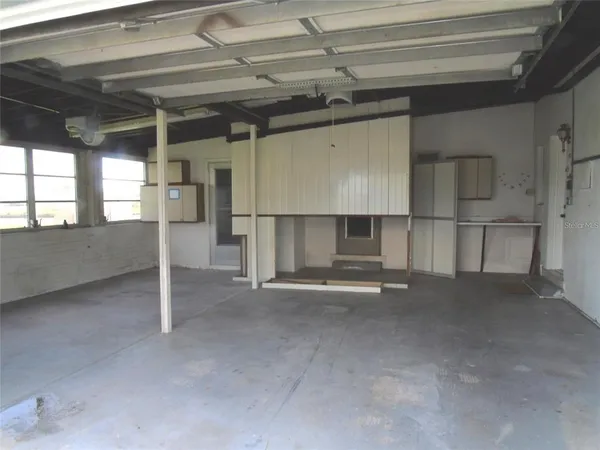 a view of a garage with storage