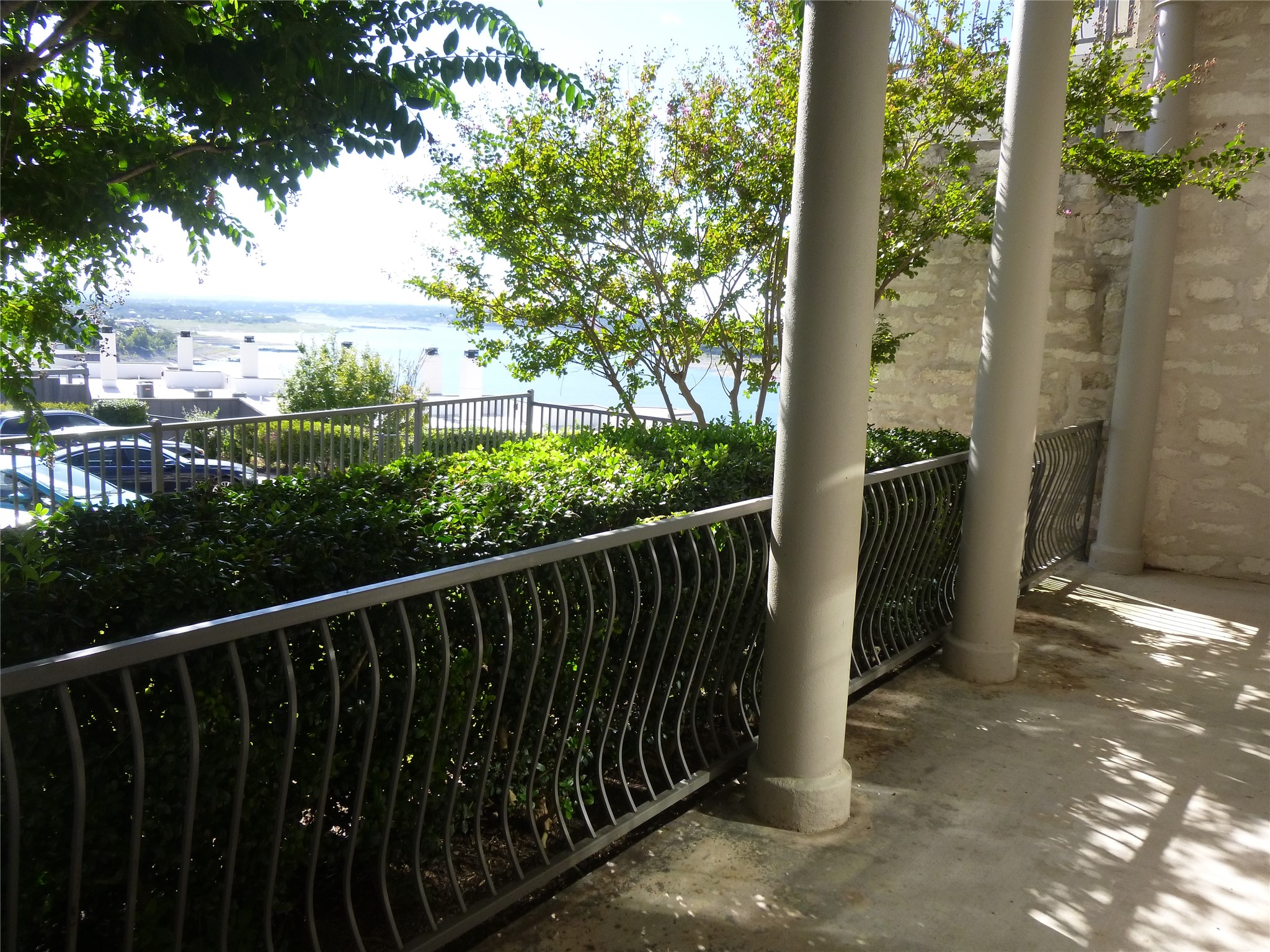 2918 Ranch Road 620 North, Unit Y194 Austin, TX 78734 - Photo 26 of 35 a view of a balcony with wooden floor and outdoor space