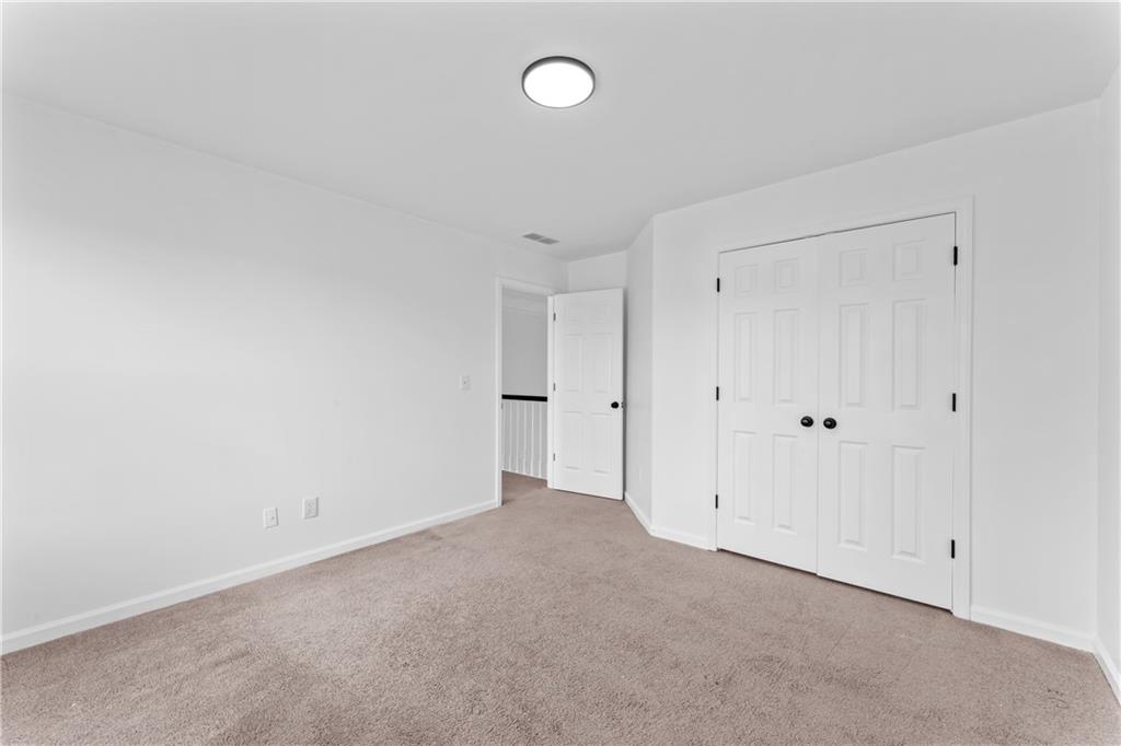 4267 Azalea Walk Ellenwood, GA 30294 - Photo 14 of 24 a view of an empty room