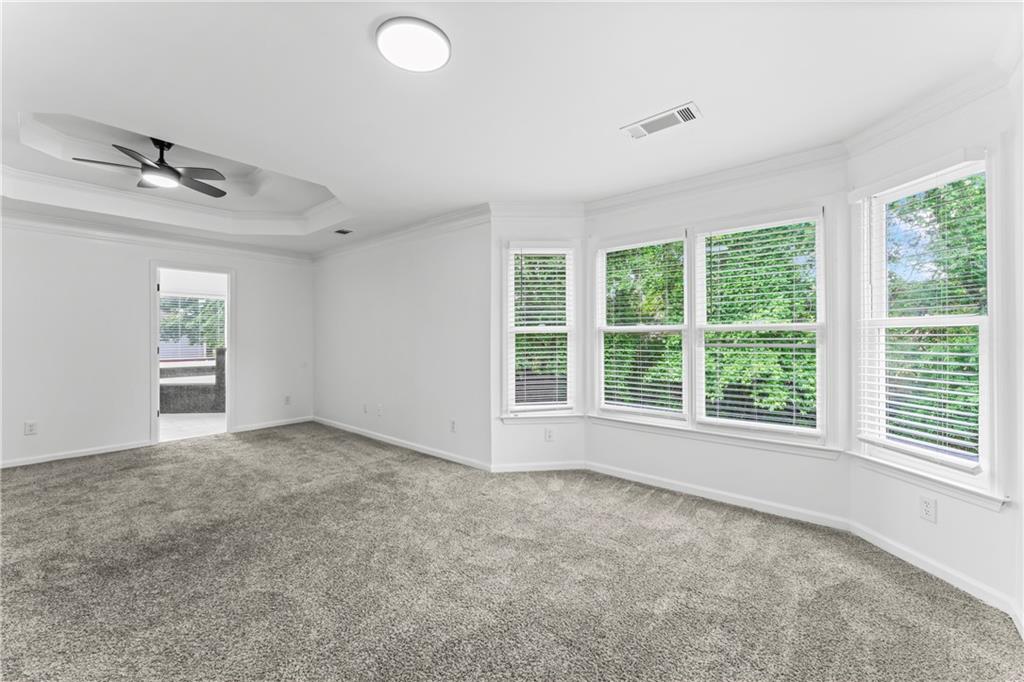 4267 Azalea Walk Ellenwood, GA 30294 - Photo 20 of 24 an empty room with windows