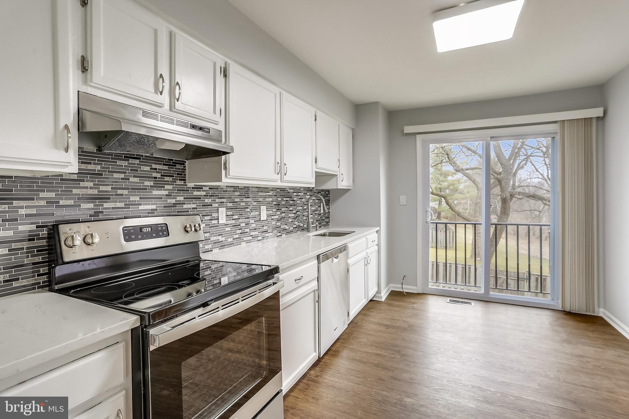 1905 Flowering Tree Terrace Silver Spring, MD 20902 - Photo 9 of 44 Updated Kitchen