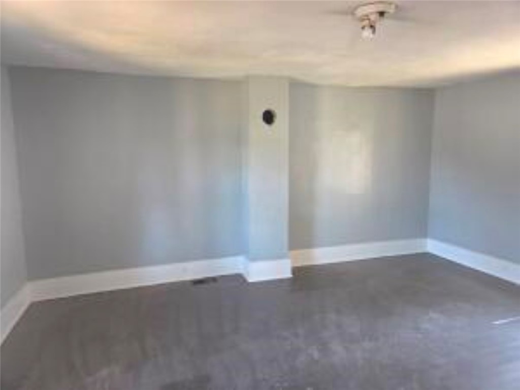 820 West North Street Springfield, OH 45504 - Photo 19 of 20 This versatile room awaits your personal touch, offering an adaptable layout for various uses.