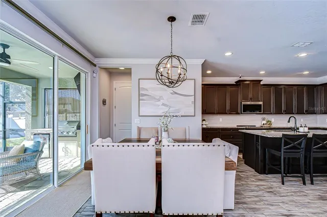 a very nice looking kitchen with cabinets