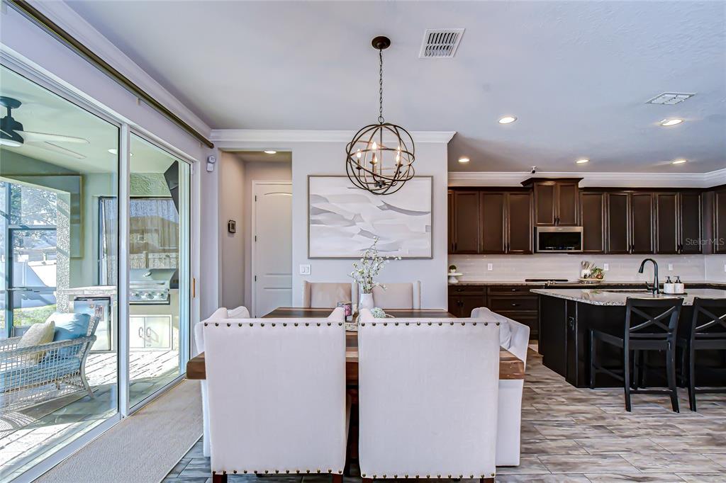 11724 Wrought Pine Loop Riverview, FL 33569 - Photo 14 of 44 a very nice looking kitchen with cabinets