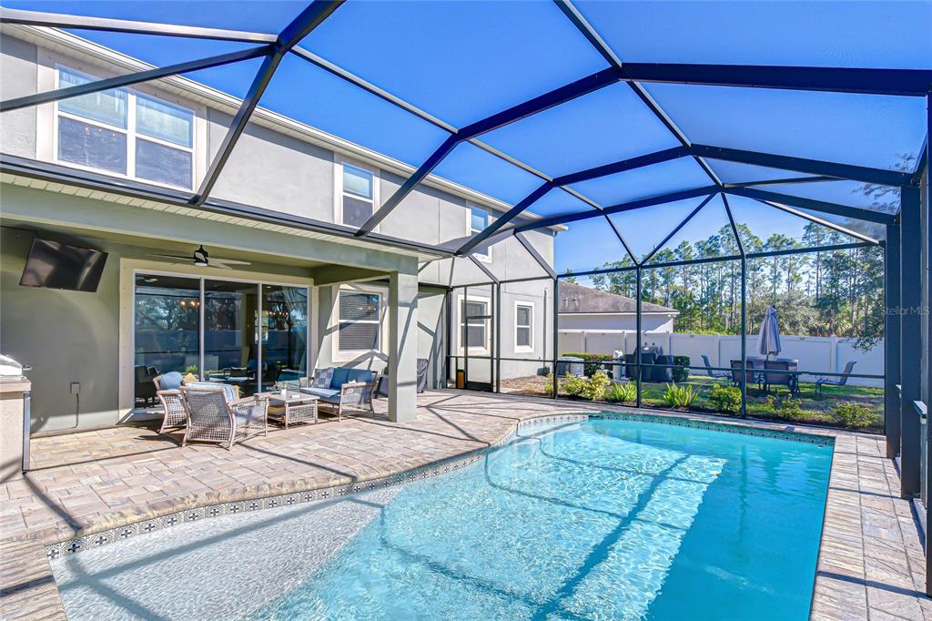 11724 Wrought Pine Loop Riverview, FL 33569 - Photo 4 of 44 a view of a backyard with sitting area