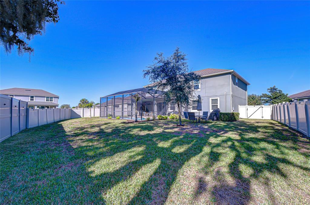 11724 Wrought Pine Loop Riverview, FL 33569 - Photo 5 of 44 a view of a house with a yard