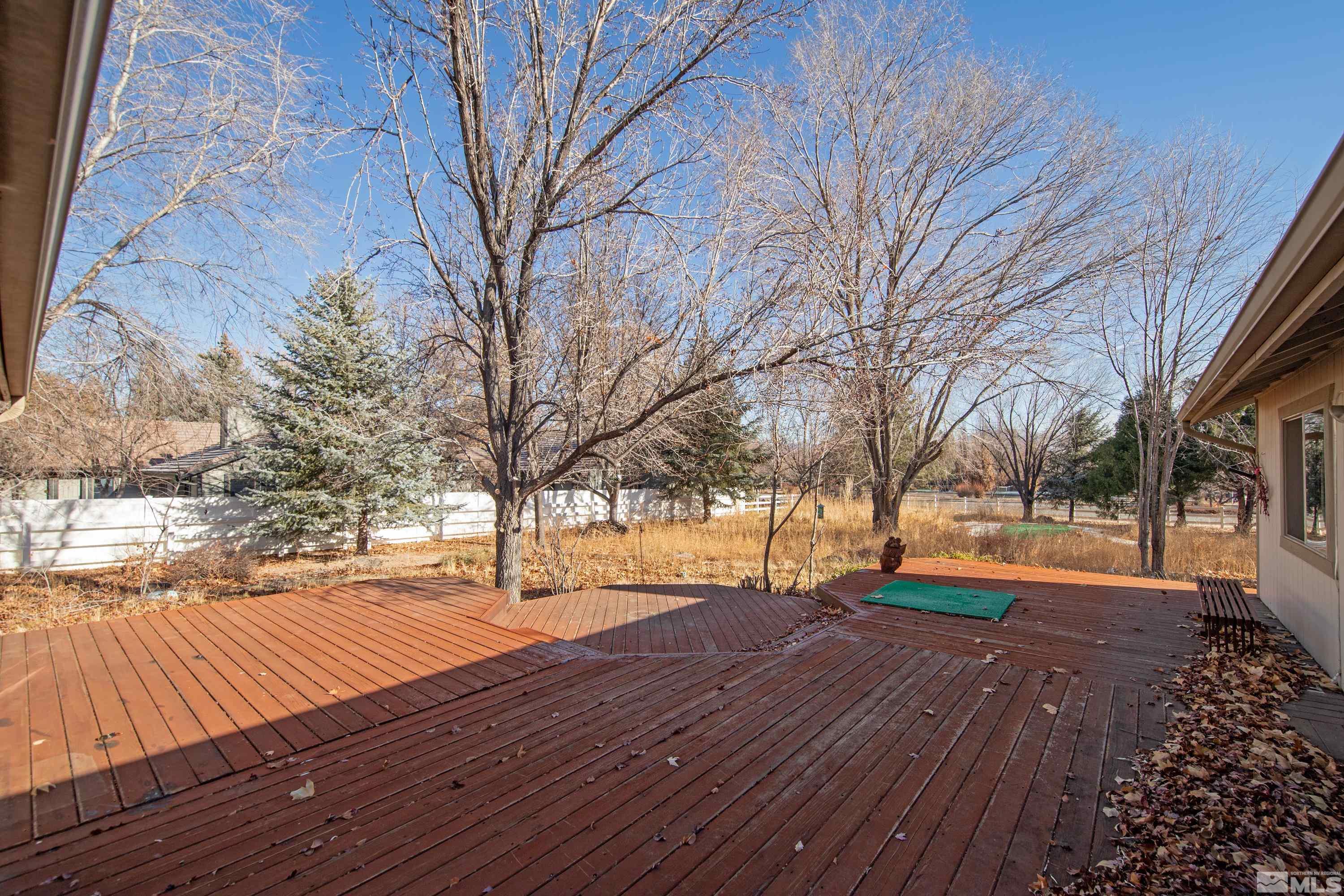 1105 West Huffaker Lane Reno, NV 89511 - Photo 17 of 20 a park view with large trees