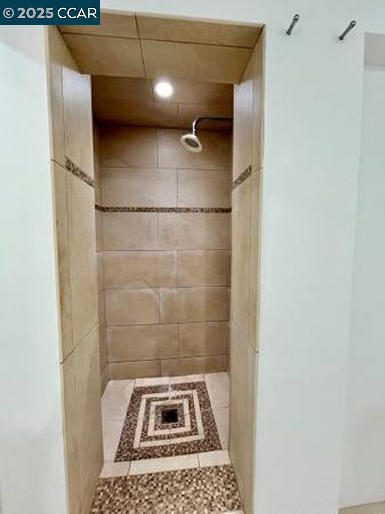 449 Burnett Avenue, Unit A San Francisco, CA 94131 - Photo 6 of 9 a bathroom with a shower