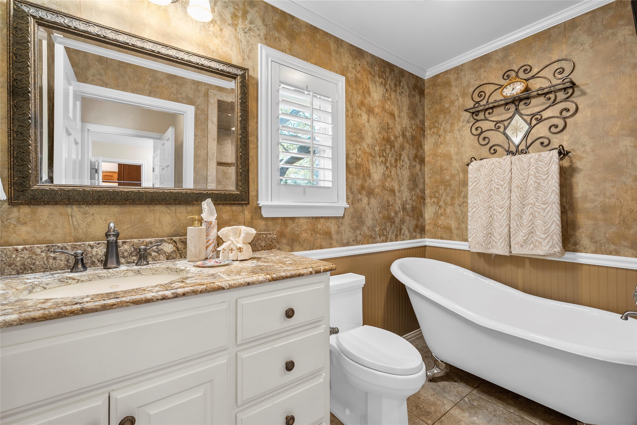 3740 Chimney Ridge Drive Waco, TX 76708 - Photo 23 of 50 a bathroom with a granite countertop toilet sink and mirror