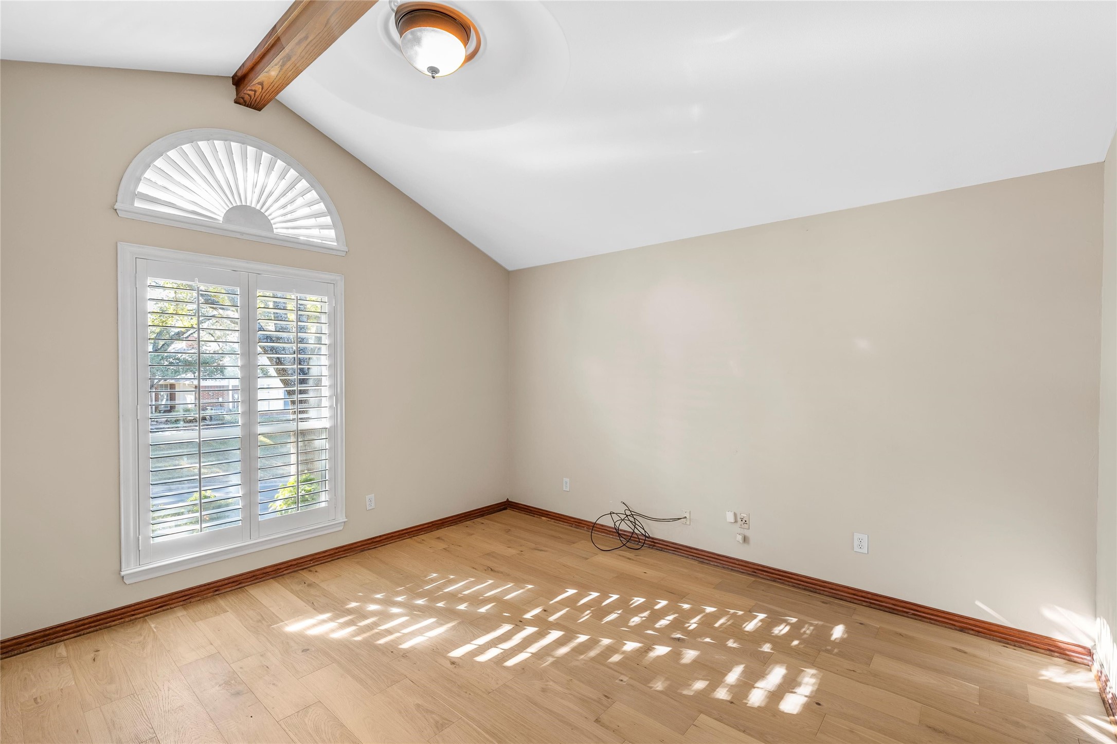 3740 Chimney Ridge Drive Waco, TX 76708 - Photo 29 of 45 an empty room with a chandeliers fan