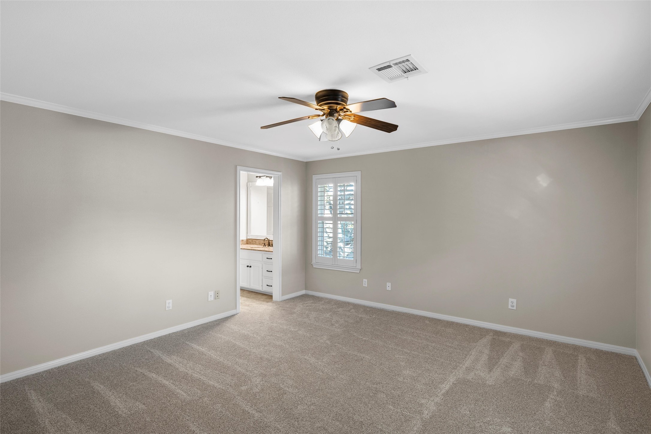3740 Chimney Ridge Drive Waco, TX 76708 - Photo 36 of 50 a view of a room with a ceiling fan and a window