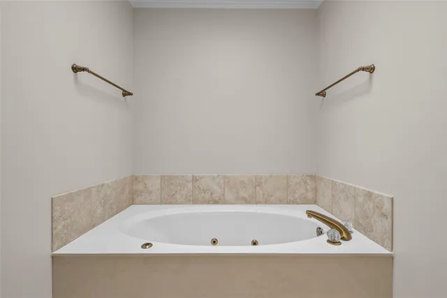 a bathroom with a granite countertop toilet sink and a mirror