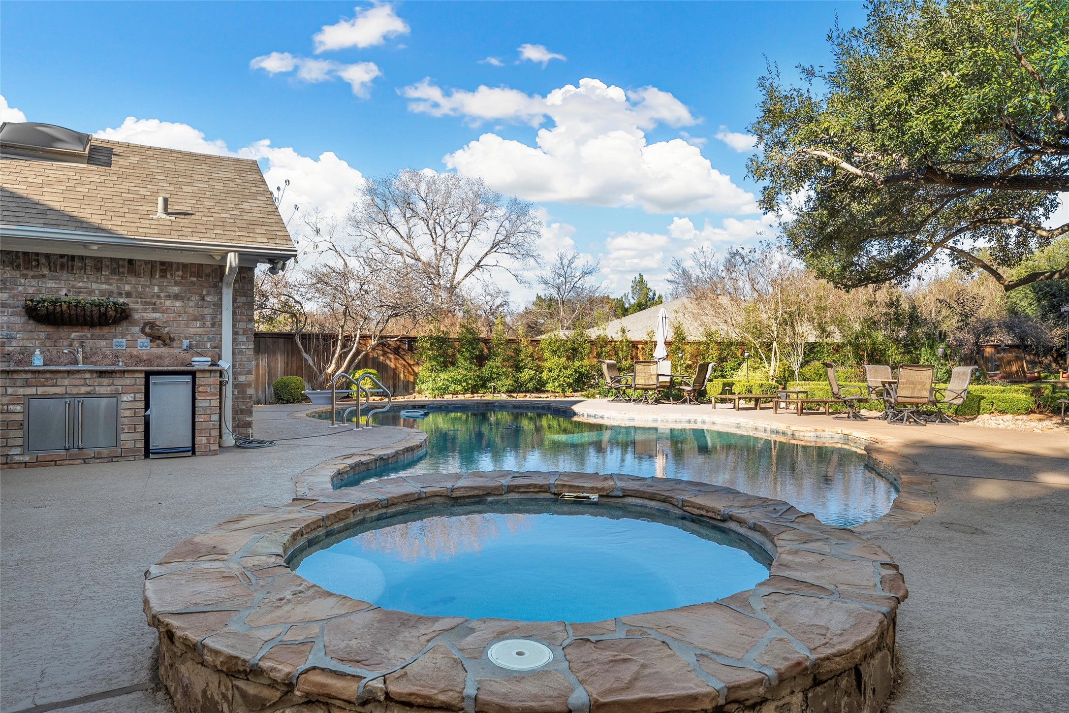 3740 Chimney Ridge Drive Waco, TX 76708 - Photo 41 of 50 a view of a swimming pool with a patio