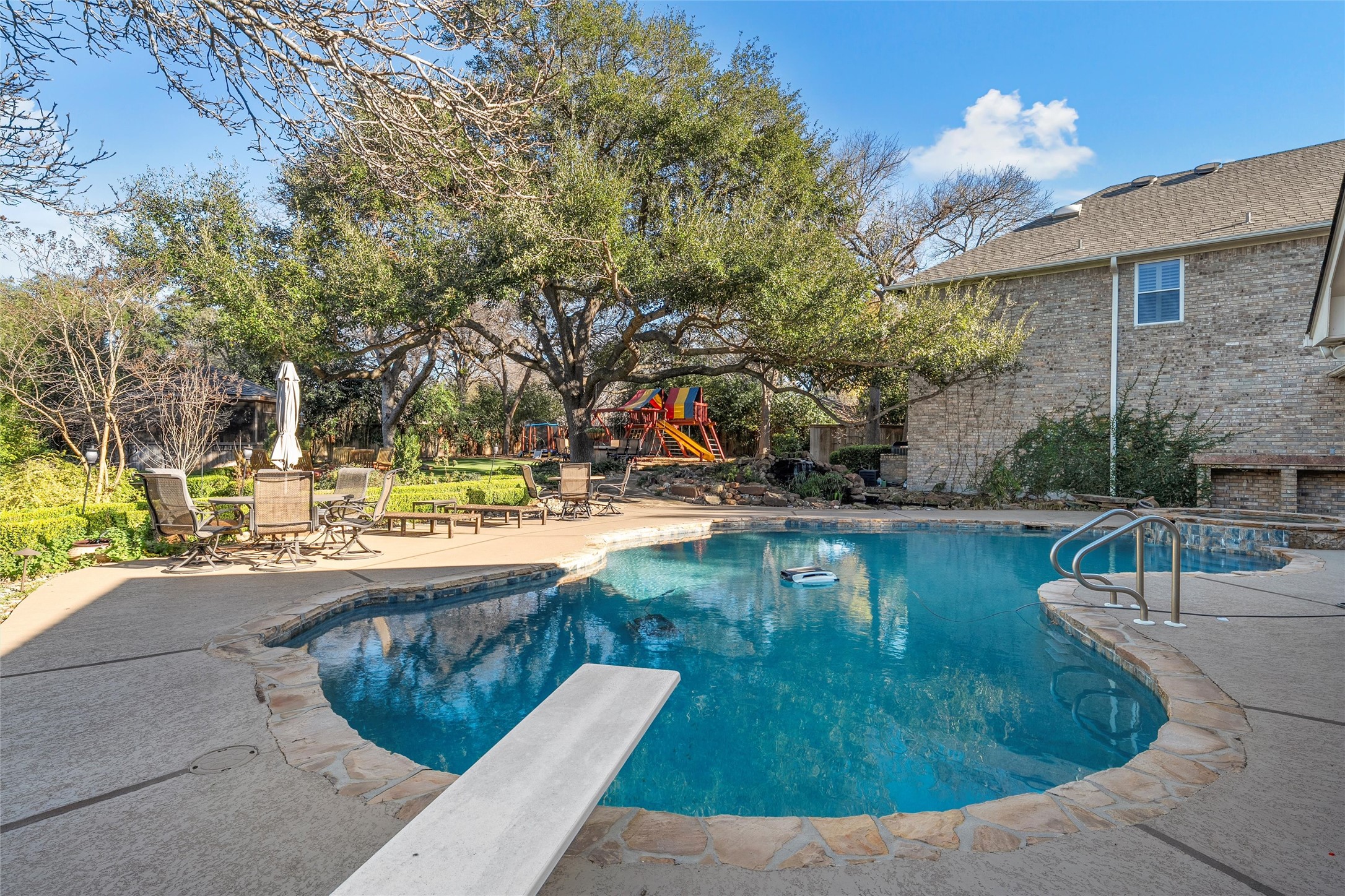 3740 Chimney Ridge Drive Waco, TX 76708 - Photo 42 of 45 a view of a swimming pool with a patio