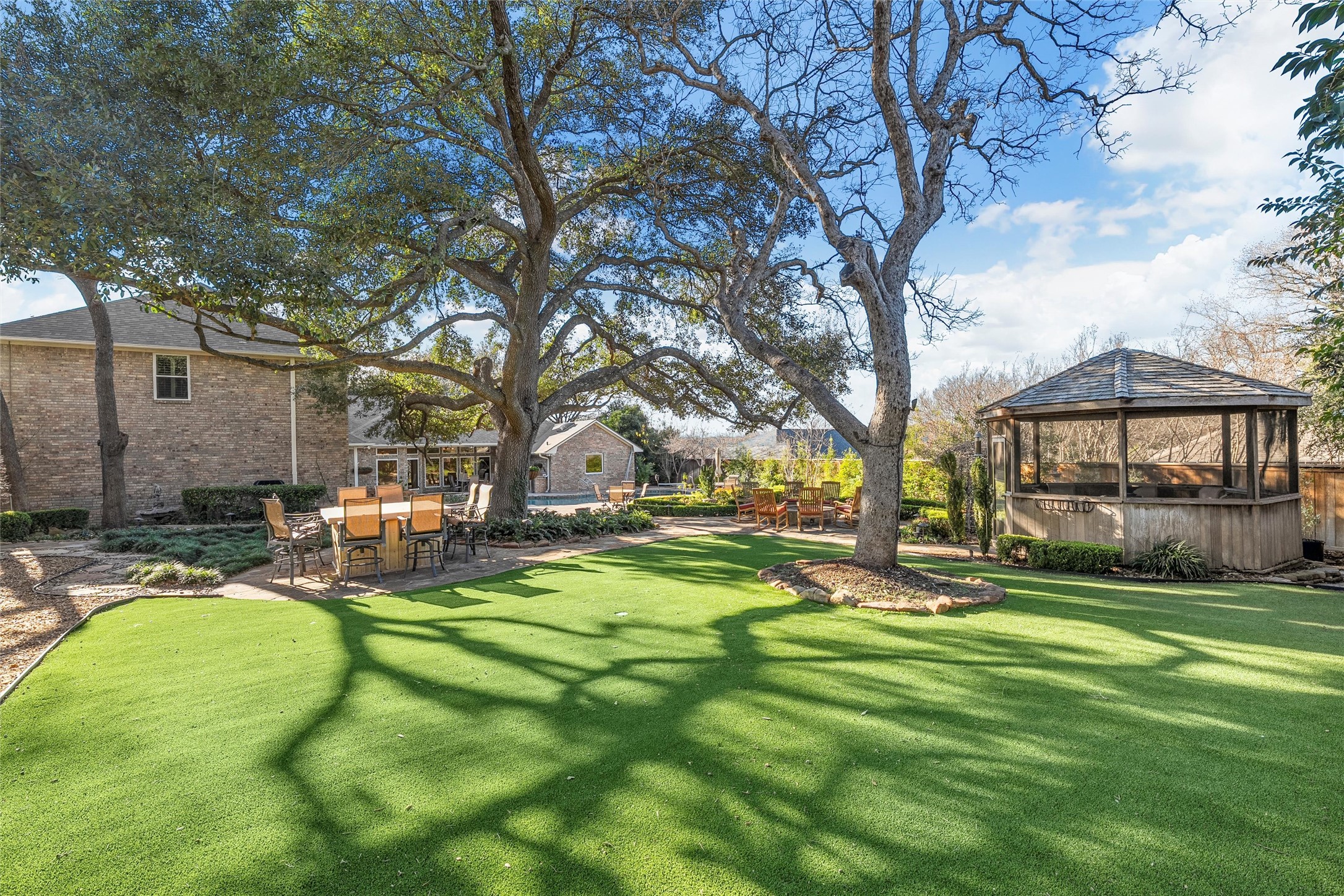 3740 Chimney Ridge Drive Waco, TX 76708 - Photo 43 of 50 a view of a house with backyard and sitting area