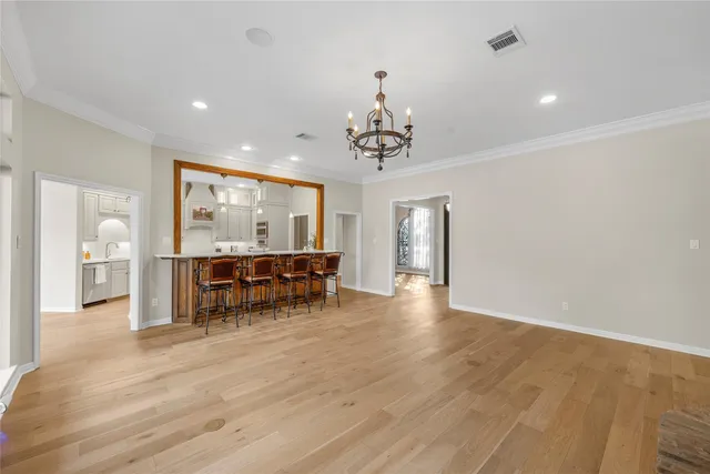 a view of livingroom with furniture and hardwood floor