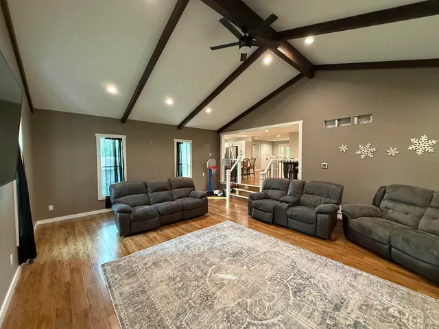 a living room with furniture and a couch