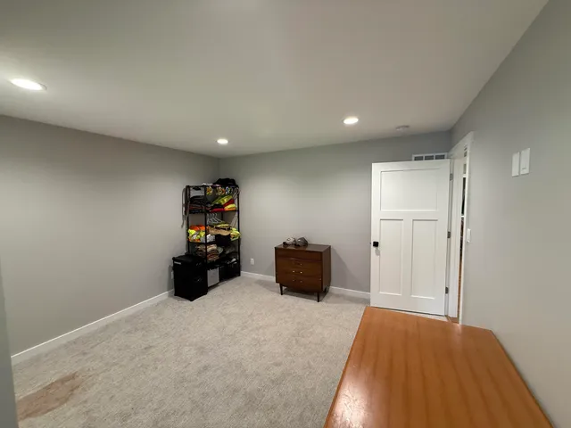 a room with closet and couch