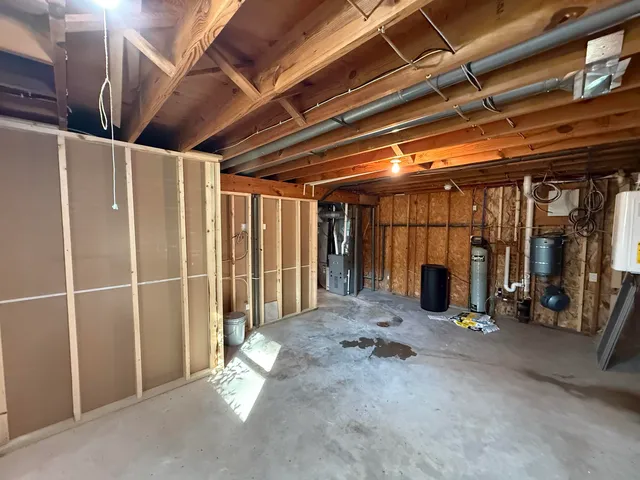 a view of an empty room with wooden walls