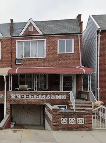 front view of a house with a balcony