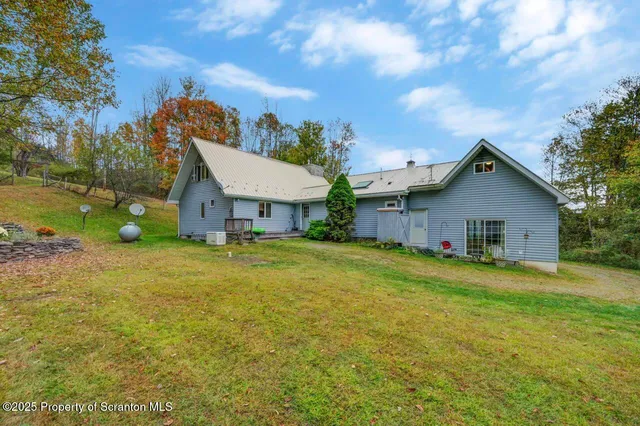 $690,000 | 242 Shore Drive, Hop Bottom, PA 18824