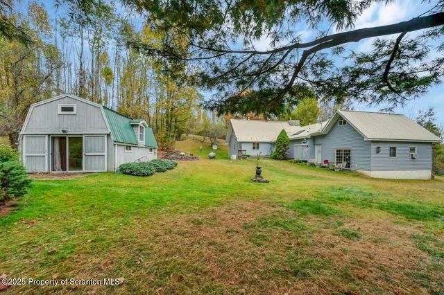 $690,000 | 242 Shore Drive, Hop Bottom, PA 18824